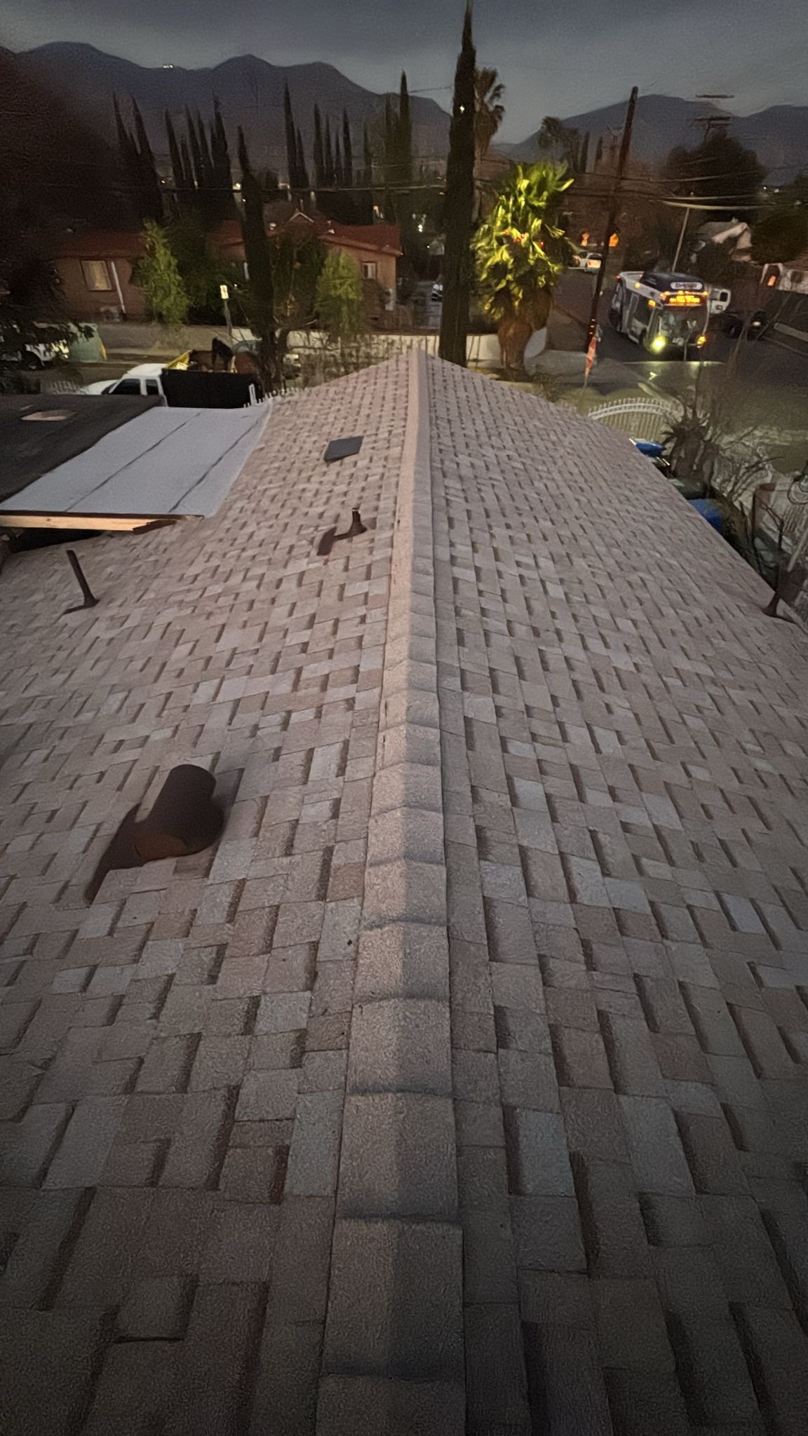 Shingle roof removal with dump truck